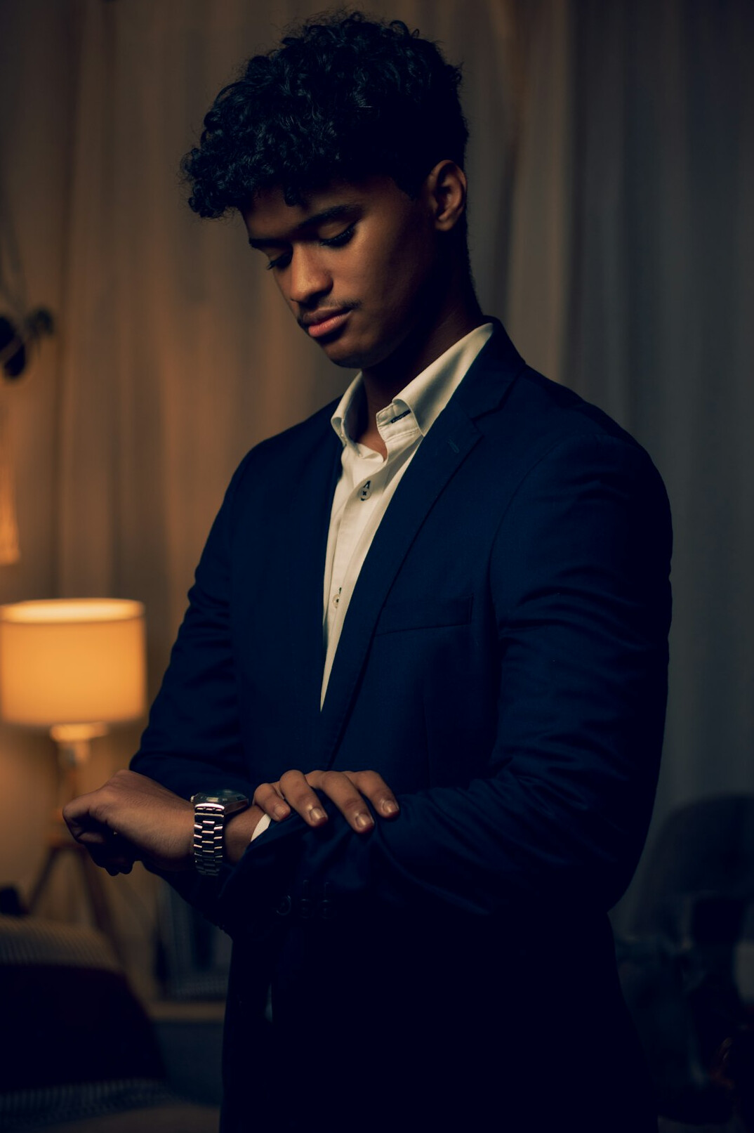 Portrait of a man in a navy blazer