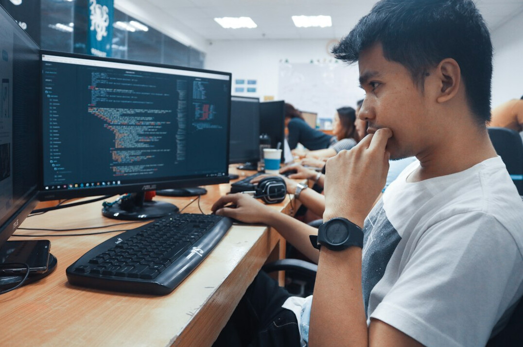 programmer writing code in office