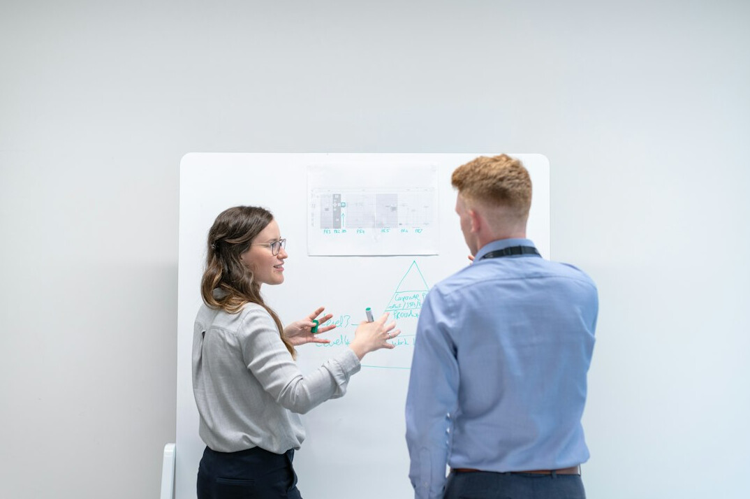 corporate team discussing software